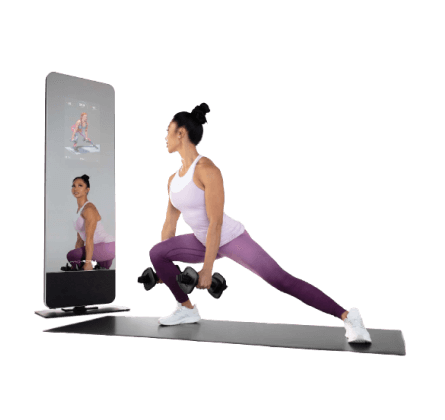 Woman does a strength workout on an iFIT-enabled fitness mirror 