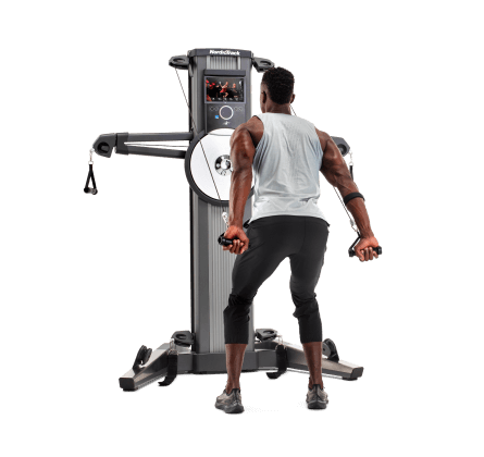 Man does a strength workout on an iFIT-enabled resistance cables